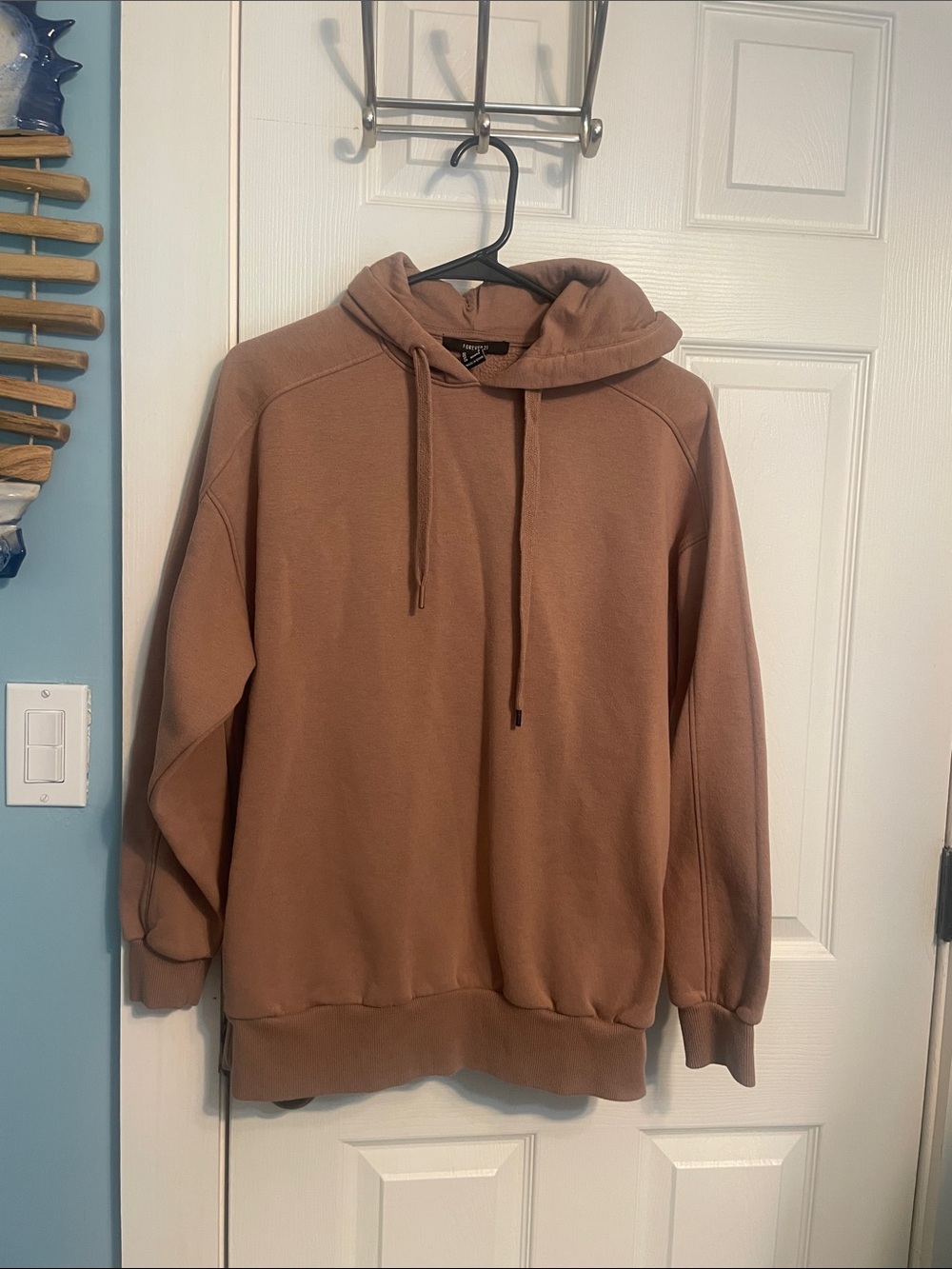 Forever 21 brown hoodie. Says small fits like a medium